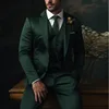 Dark green suit vest and dress pants