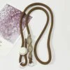 Brown rope with beige knot