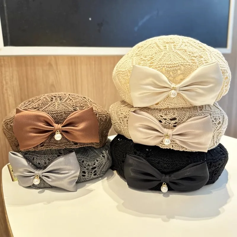 Women Trendy Bow Pearl Woven Beret Hat Summer Hollow Out Hat  display picture 1