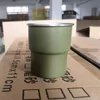 Frosted green step cup