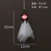 Sombrero de bruja negro con pequeño fantasma brillante
