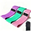Green, pink, and purple instruction manual in mesh bag set