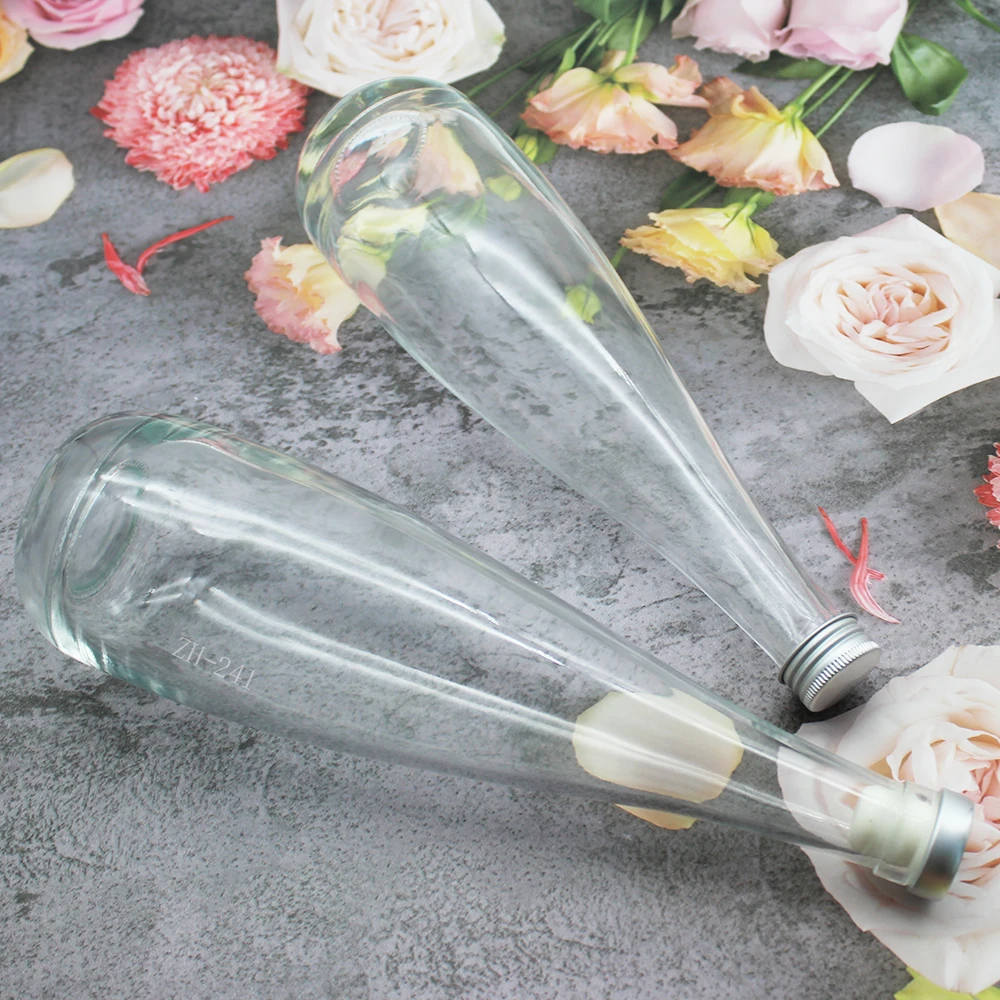 Nice 200ml 375ml 500ml 750ml Transparent Round Empty Flint Glass Liquor Wine Vodka Tequila Bottle with sealed Cork Lid