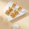 Orecchini pendenti con orsetto dell'amore sdraiato in oro
