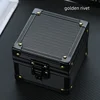 Black with golden rivets