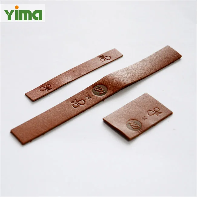 
Пользовательский логотип тисненые джинсы из натуральной кожи или ПВХ патч с металлом и этикеткой из ПУ для одежды 