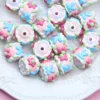 Perline bianche-fiori rosa-blu k