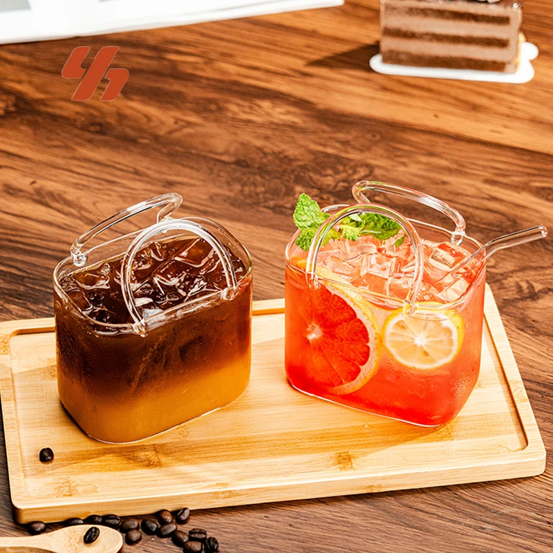 Handbag-shaped drinking glasses with loop handles