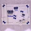 Corona in argento con diamanti blu royal
