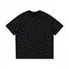 Nero con pois grigi
