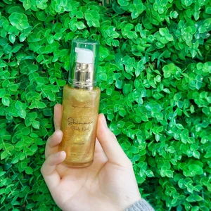 Viral Coconut Mango Gold Shimmer Body Oil Highlighting Moisturizer for Body Glow