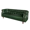 Dark green three-seat sofa