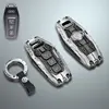 Silver case with circular keychain