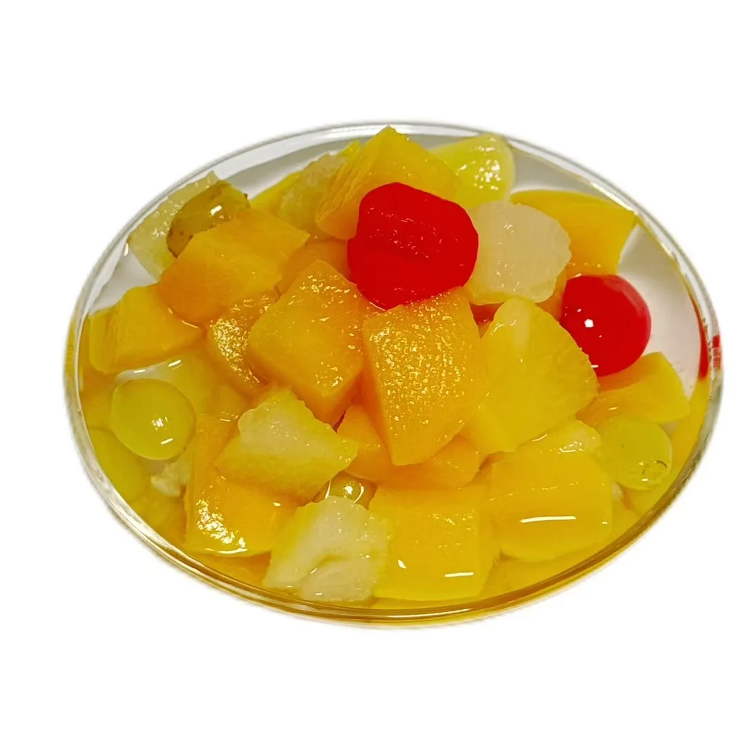 Fresh and High-quality Fruit Cocktail Jar Is Crafted From Tropical Fruits and Features Canned Fruits Soaked in Syrup.