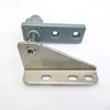 Lower left plastic spring-loaded hinge