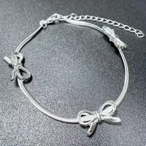 Chic Silver Tone Bowknot Bracelet with Snake Chain Adjustable Cute Fashion Jewelry for Women Trendy Accessory Daily Wear Gift