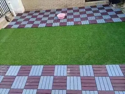 Cheap Luxury Wooden Texture Interlocking PP Deck Tiles Wood Grain Design Waterproof Eco-friendly 5 Year Warranty for Outdoor