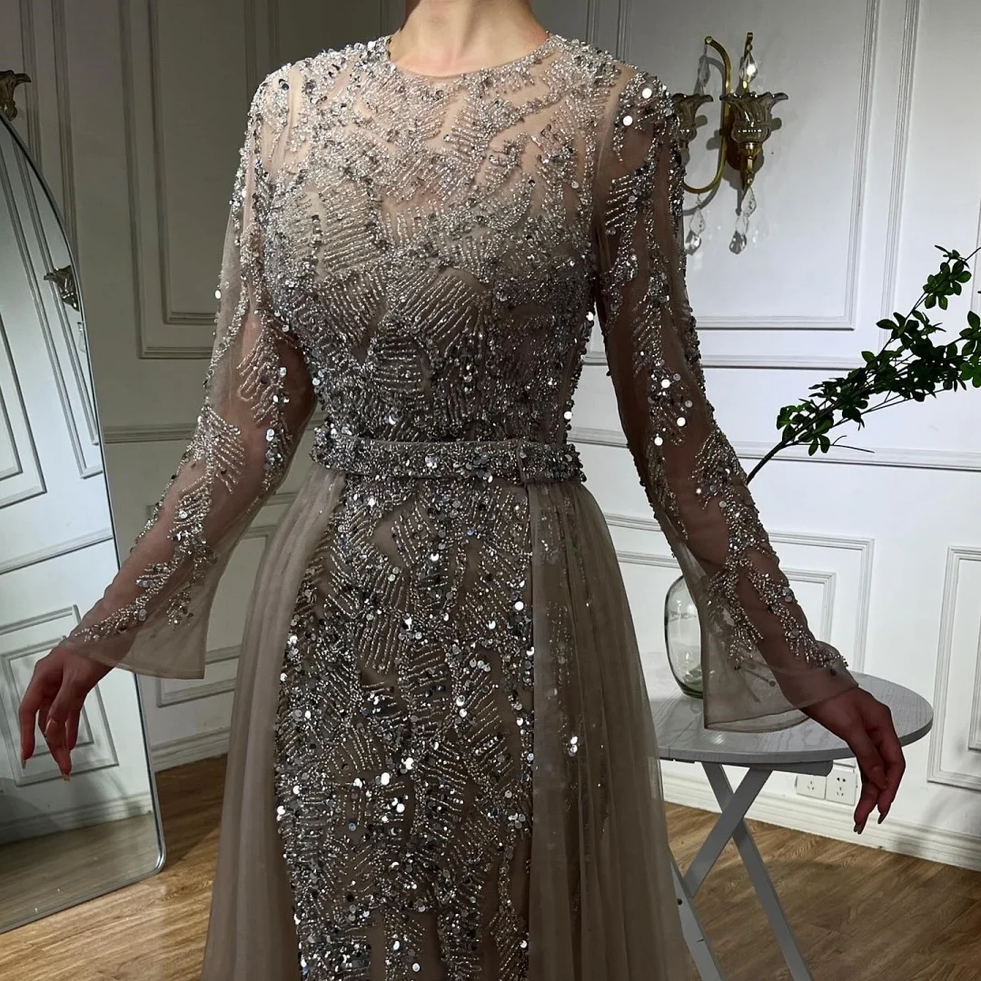 Serene Hill LA72601 Caramel Long Sleeves Mermaid Beaded Evening Dresses Over Skirt Party Gowns for Women 2026 Serene Hill LA72601 Caramel Long Sleeves Mermaid Beaded Evening Dresses Over Skirt Party Gowns for Women 2026