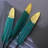Coltello verde scuro con polvere dorata spray