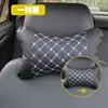 A pair of red wine headrests (with white thread)