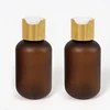 Frosted amber bottle+disc lid