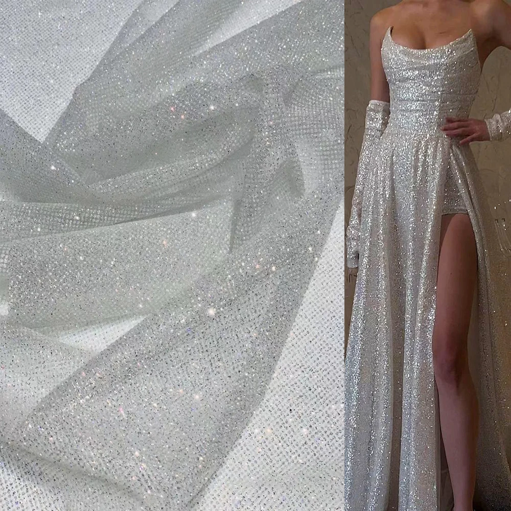 Alibaba.com: Ivory White Sparkle Glitter Net Fabric with shimmer and sequins  for bridal dresses. Durable and elegant material ideal for wedding party  attire.