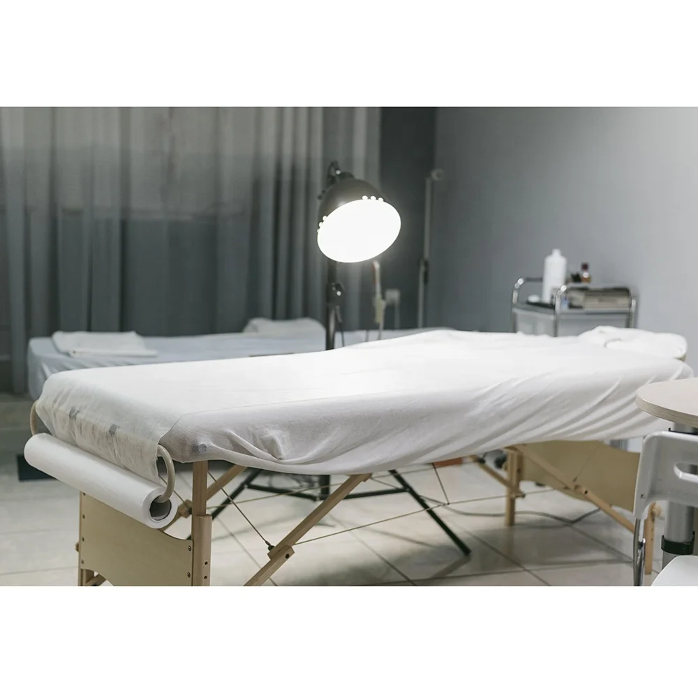 China Manufacturer Suning Disposable Hospital Bed Sheets Paper Couch Roll