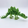 Estegosaurio de color amarillo verdoso de 18 cm de largo