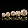 6mm gold-rimmed white diamond