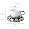 Cloud-shaped foil white electric coffee cup and saucer