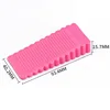 Small pink triangular door stop