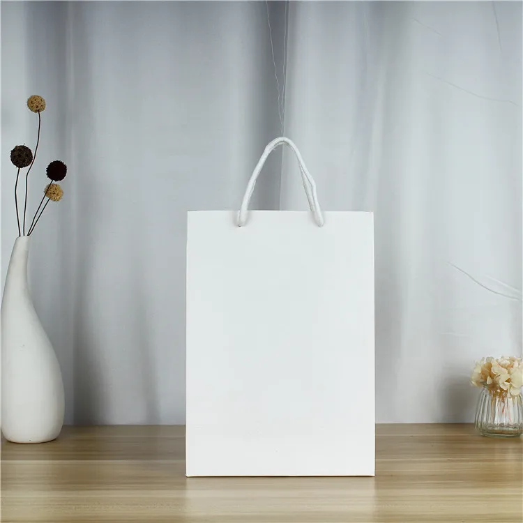 Бутиковая подарочная упаковка пакеты из крафт-бумаги печать логотипа