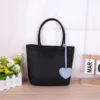 Bolso individual negro [llevar con ambas manos]