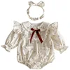 Piccolo fiocco rosso beige