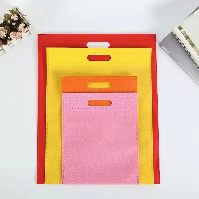 Hot Sell Eco Friendly Biodegradable Reusable Recycled Cheap Die Cut Non Woven Shopping Bag with Custom logo Printed supplier