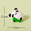 Panda che abbraccia il bambù