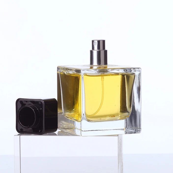 Wholesale 30ml 50ml 100ml square transparent perfume glass bottle spray empty perfume bottle with lid