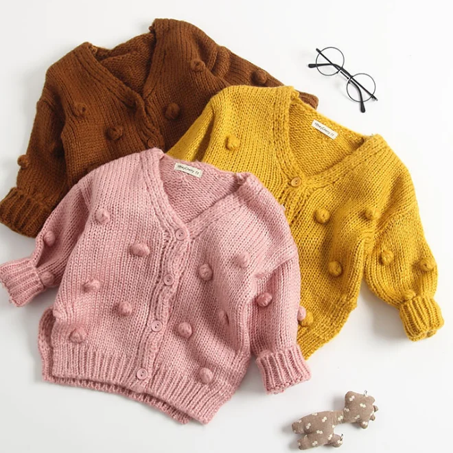 colorful pom pom sweater