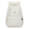 Beige backpack.