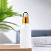 Marigold cover + white glue dropper + frosting bottle