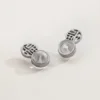 White K "Fu" character earplugs