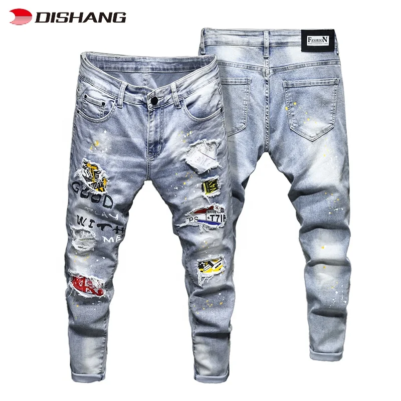 Hot Sale New Men Fashion Jeans Biker Denim Pant Wild Denim Fabric  Distressed Spray Paint Ripped Slim Fit Patched Pants Jeans