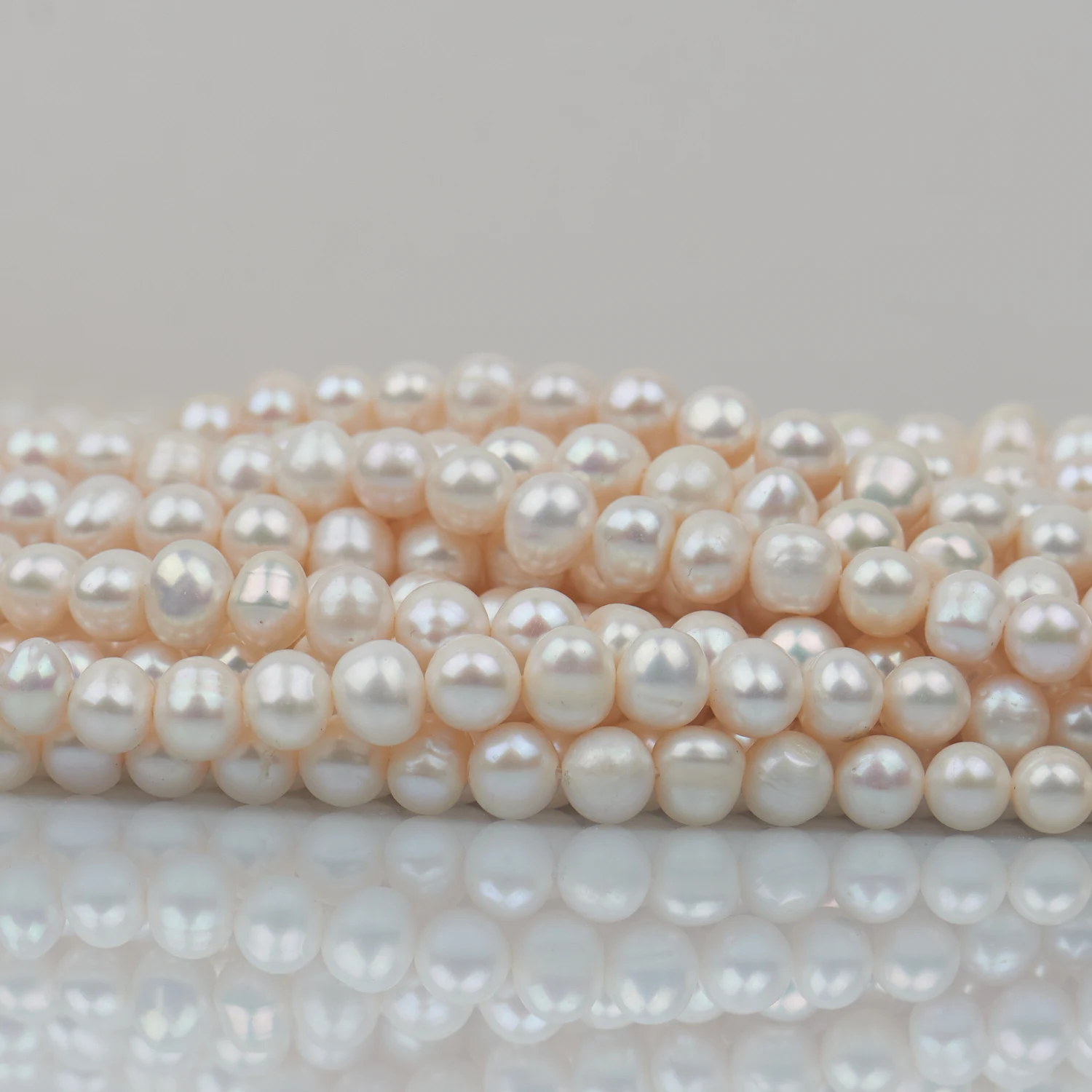 Zhuji Pearl Market Natural White Color 7-8mm Near Round Shape Freshwater Pearl Strands