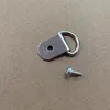 One screw with a thick wire, single hole, and large semicircle.