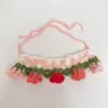 Pink lily of the valley bib