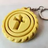 Juego de tres piezas de llavero con cruz