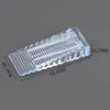 Small transparent triangular door stop
