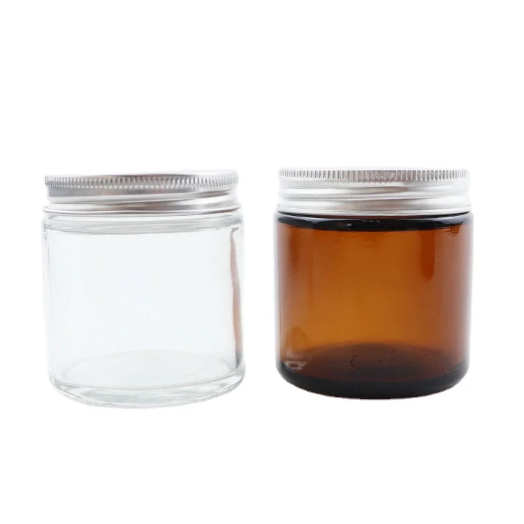 Wholesale customized jar clear amber round glass jars with screw aluminum lid for food candy