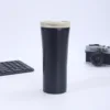 Black cup with white lid