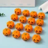 Small pumpkin-head pull-back car